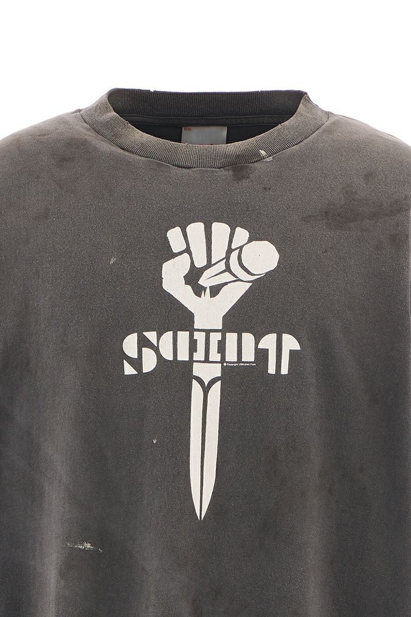 SAINT Mxxxxxx(セントマイケル) SM-HR1-0000-001 / SS TEE / FIST / BLACK 半袖Tシャツ
